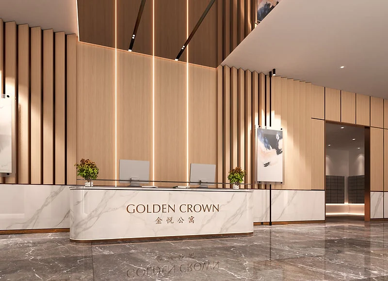 Concierge counter at Golden Crown Residence, in white marble with the Golden Crown name inlaid