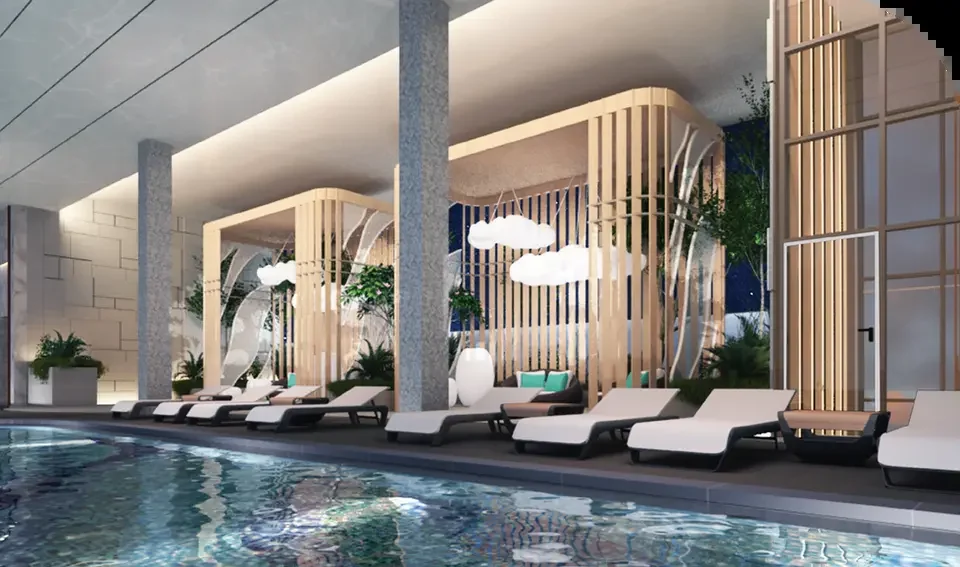 Swimming pool deck with sun loungers and cabanas at Golden Crown Residence